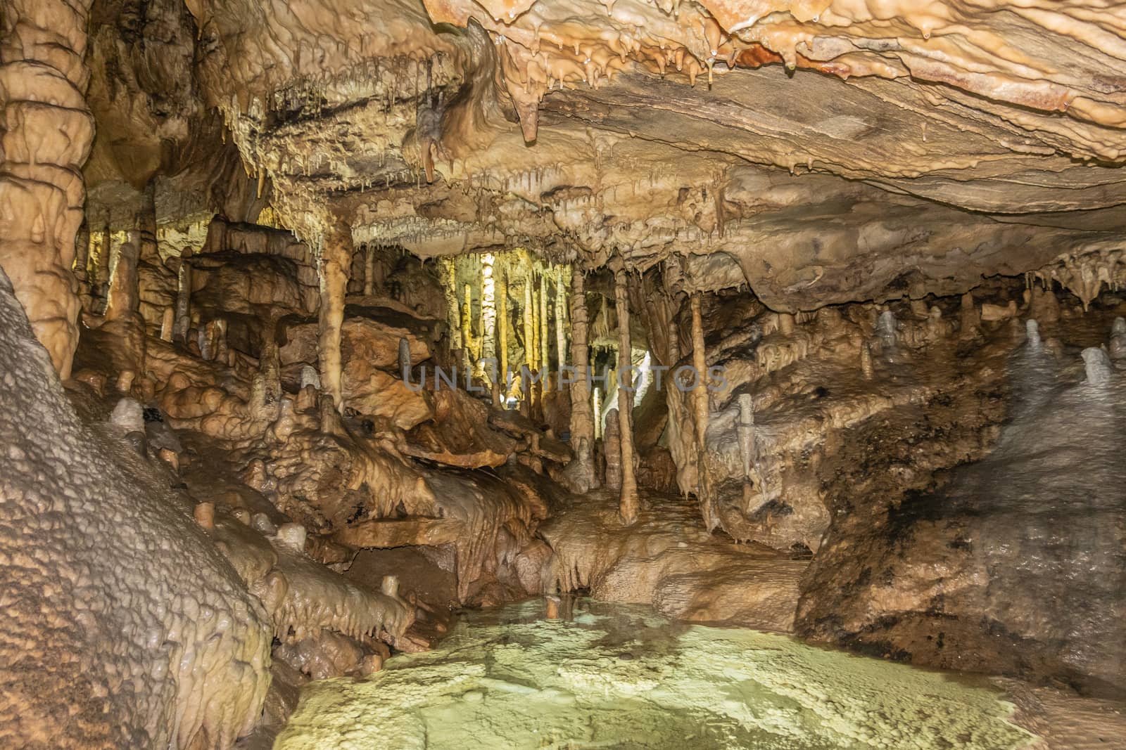 Han-sur-Lesse, Belgium - June 25, 2019: Grottes-de-Han 10 of 36. subterranean pictures of Stalagmites and stalactites in different shapes and colors throughout tunnels, caverns and large halls..