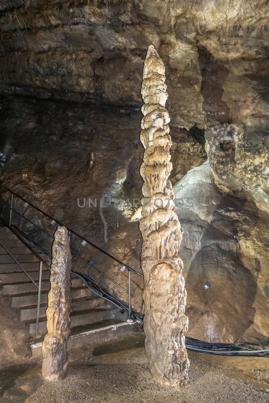 Han-sur-Lesse, Belgium - June 25, 2019: Grottes-de-Han 13 of 36. subterranean pictures of Stalagmites and stalactites in different shapes and colors throughout tunnels, caverns and large halls.