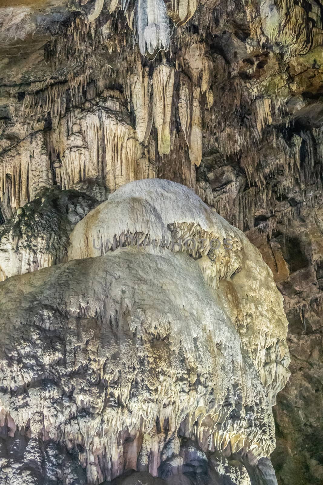 Han-sur-Lesse, Belgium - June 25, 2019: Grottes-de-Han 23 of 36. subterranean pictures of Stalagmites and stalactites in different shapes and colors throughout tunnels, caverns and large halls..