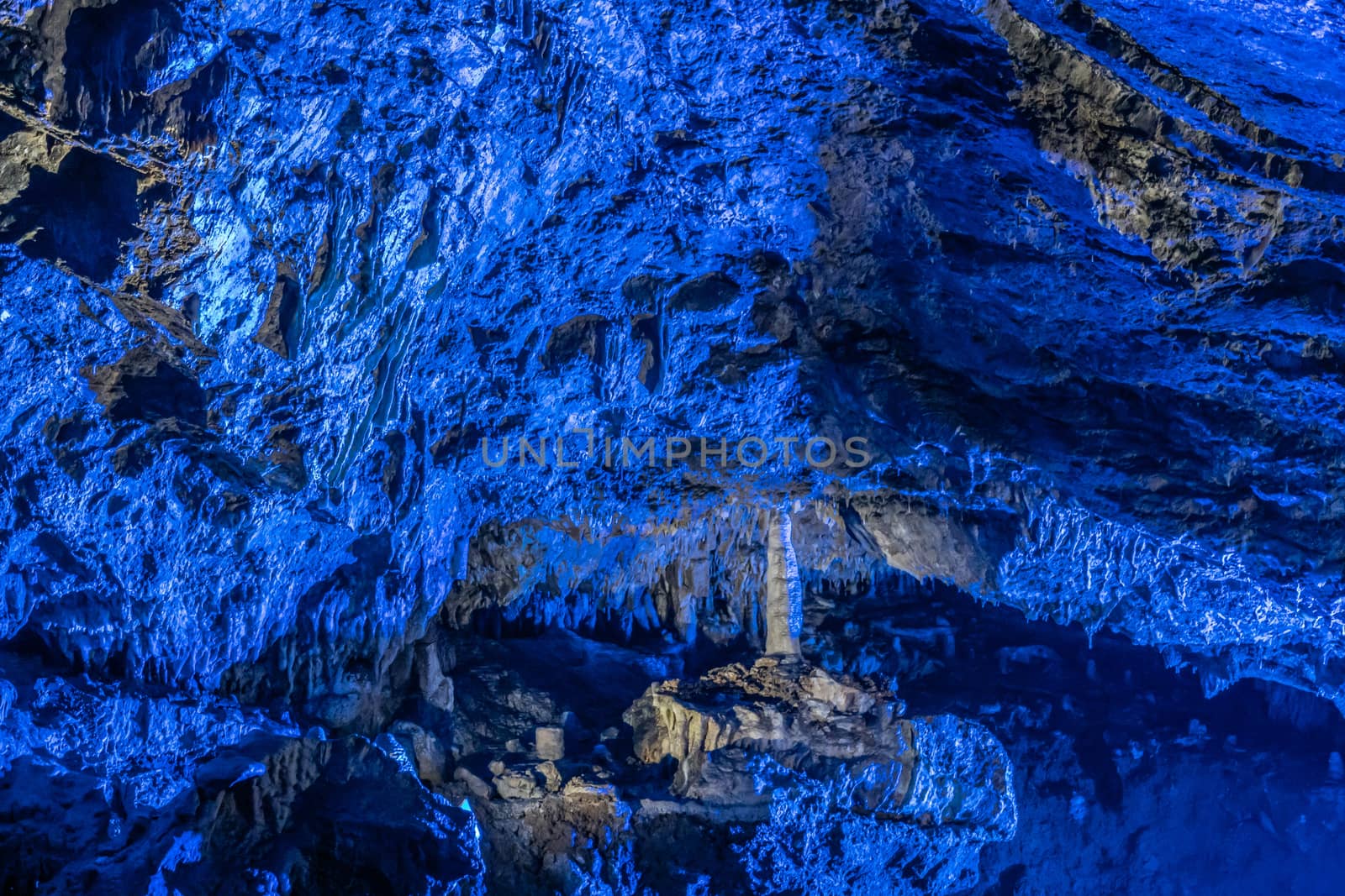 Han-sur-Lesse, Belgium - June 25, 2019: Grottes-de-Han 30 of 36. subterranean pictures of Stalagmites and stalactites in different shapes and colors throughout tunnels, caverns and large halls.. Lightshow.