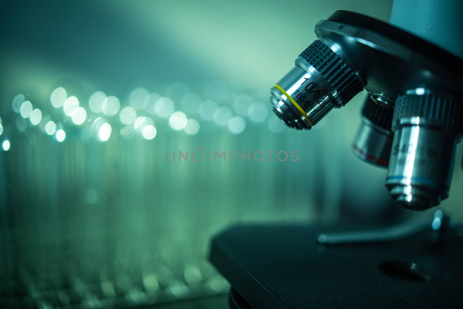 microscope and laboratory test tube , science research concept