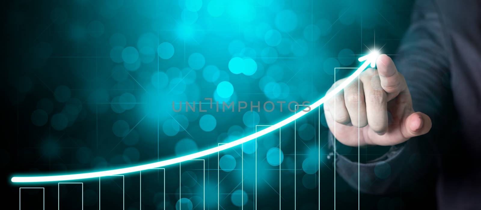 businessman hand point on growth up graph.