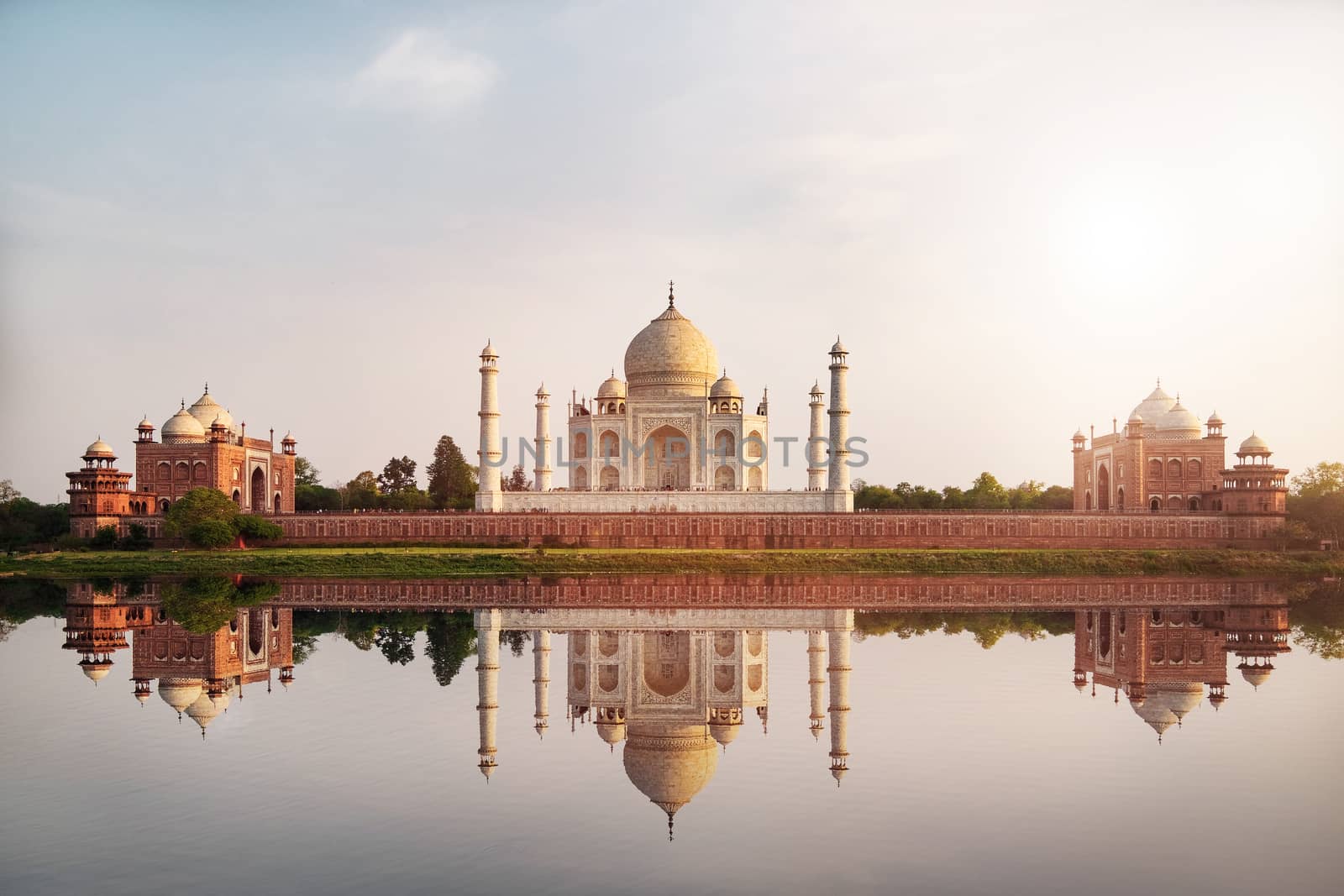 Sun set at Taj Mahal seen from Mehtab Bagh reflect on Yamuna river, an ivory-white marble mausoleum on the south bank of the Yamuna river in Agra, Uttar Pradesh, India. 