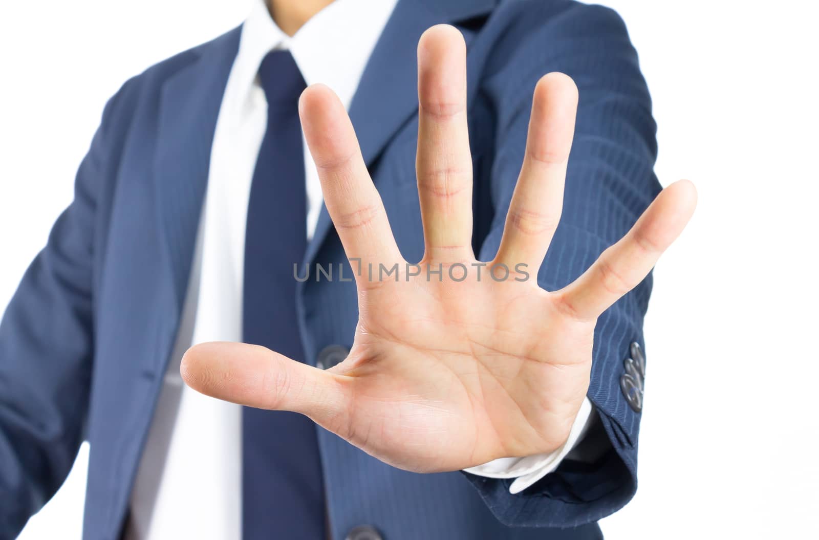 Businessman in Blue Suit Show Stop Sign of Hand Isolated on White Background. Concept about Stopping or Prevent.