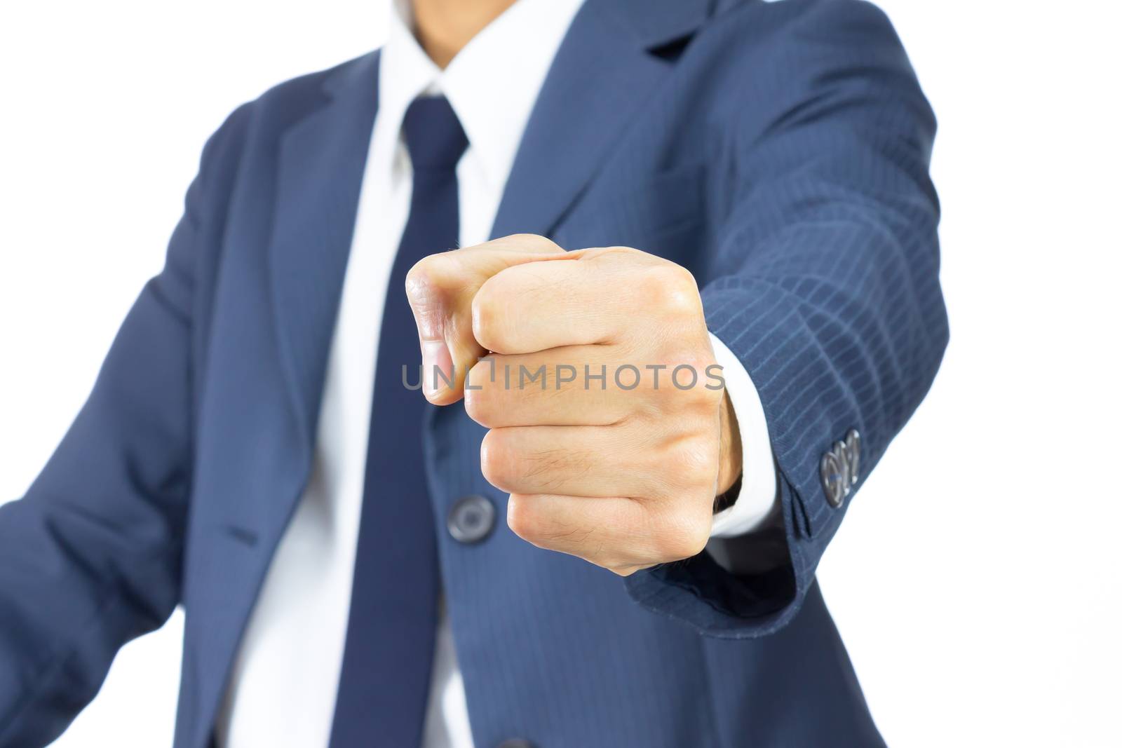 Businessman Fist in Blue Suit Isolated on White Background on Vertical View. Concept about Violence or Strike in Organization