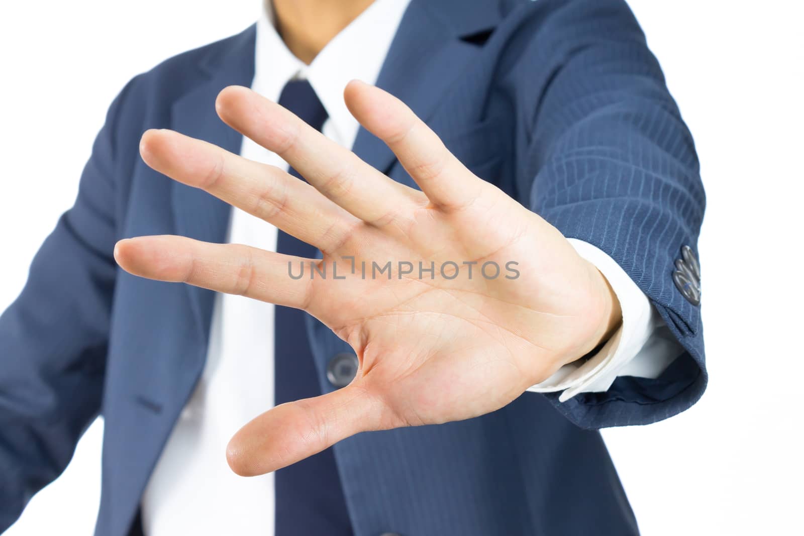 Businessman in Blue Suit Show Stop Sign of Hand on Tilt View Isolated on White Background. Concept about Stopping or Prevent.