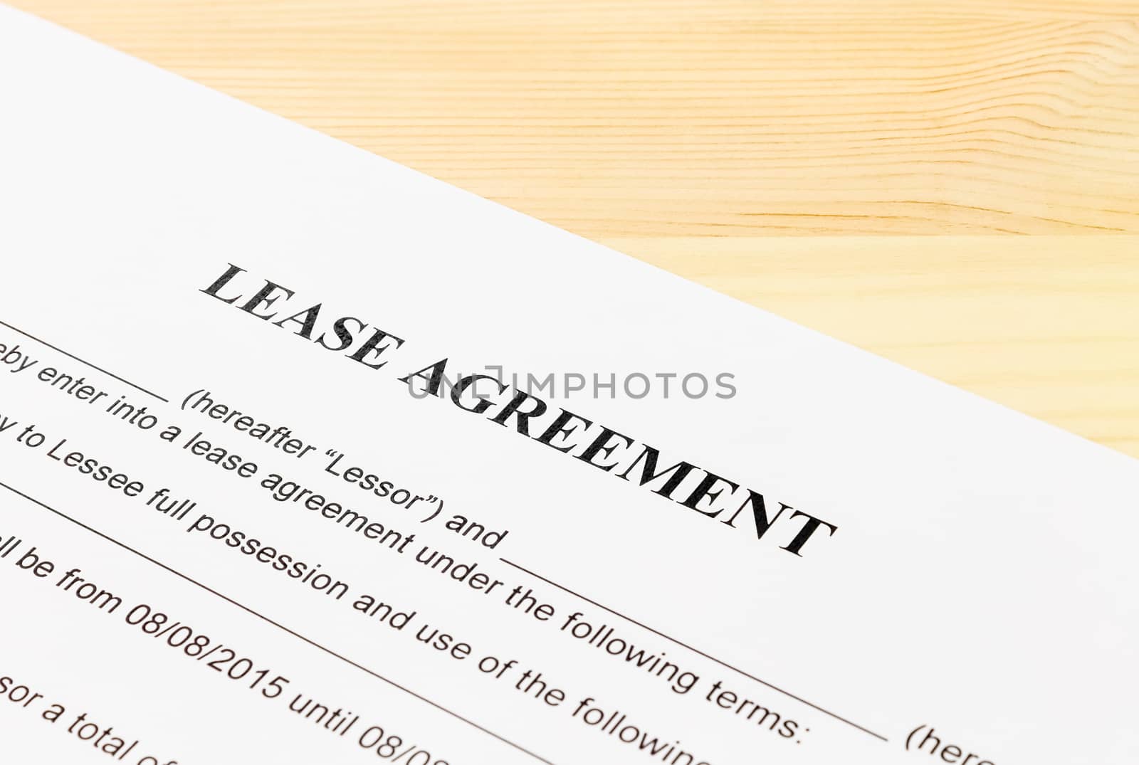 Lease Agreement Contract Document on Wood Table Left Angle View. Legal document for business event