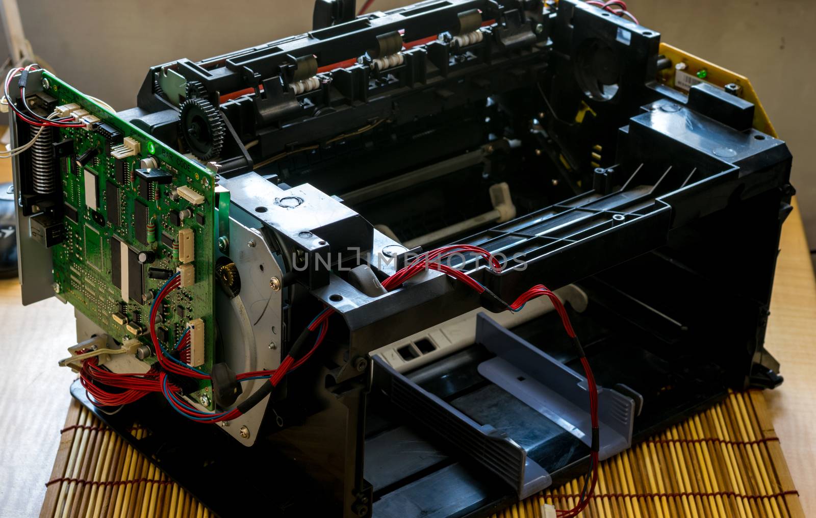 laser printer disassembled with the wires and the motherboard by jk3030