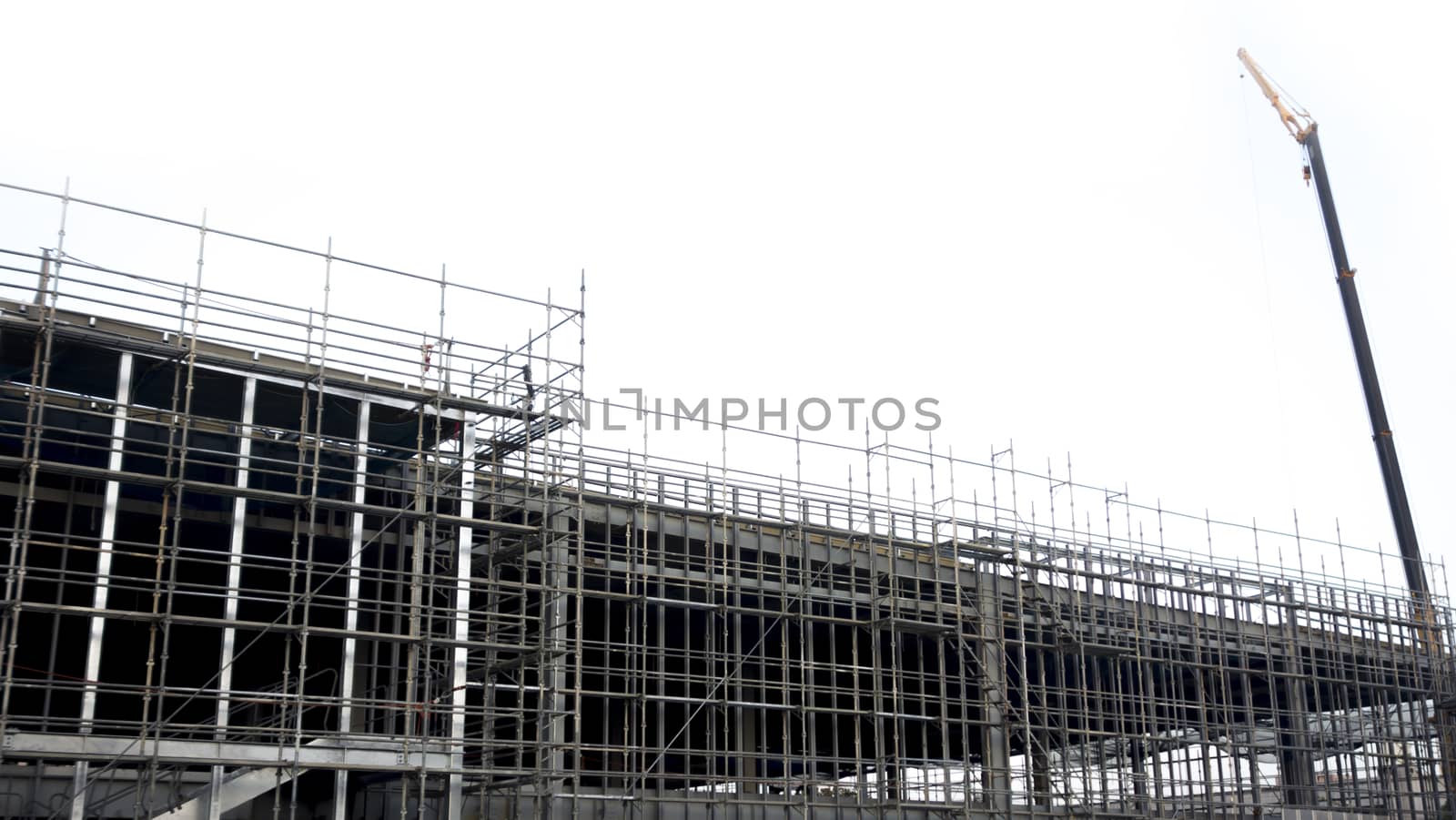 Construction building with Scaffolding around the building and H by Kingsman911