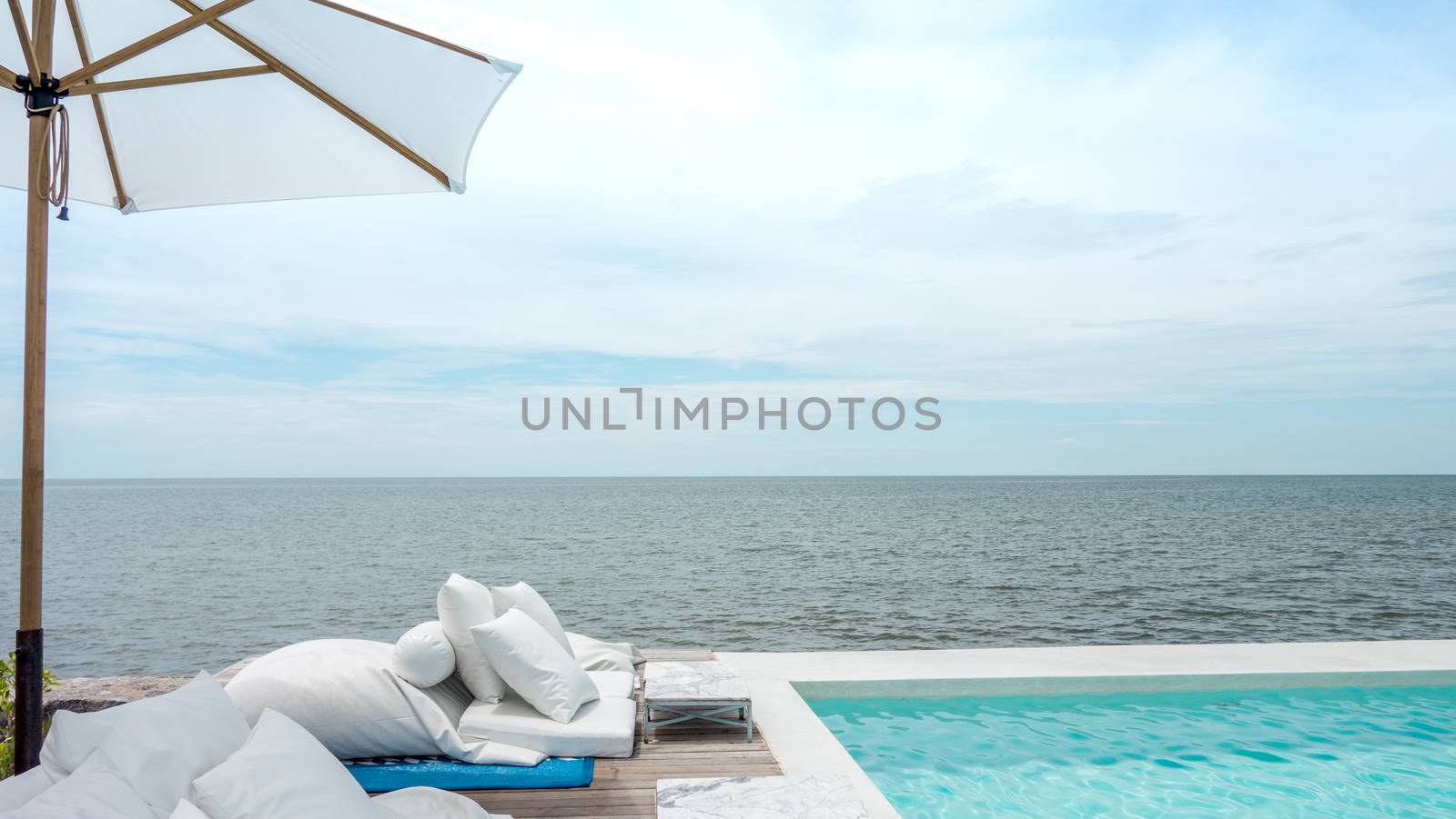 swimming pool with panoramic sea view at luxury villa