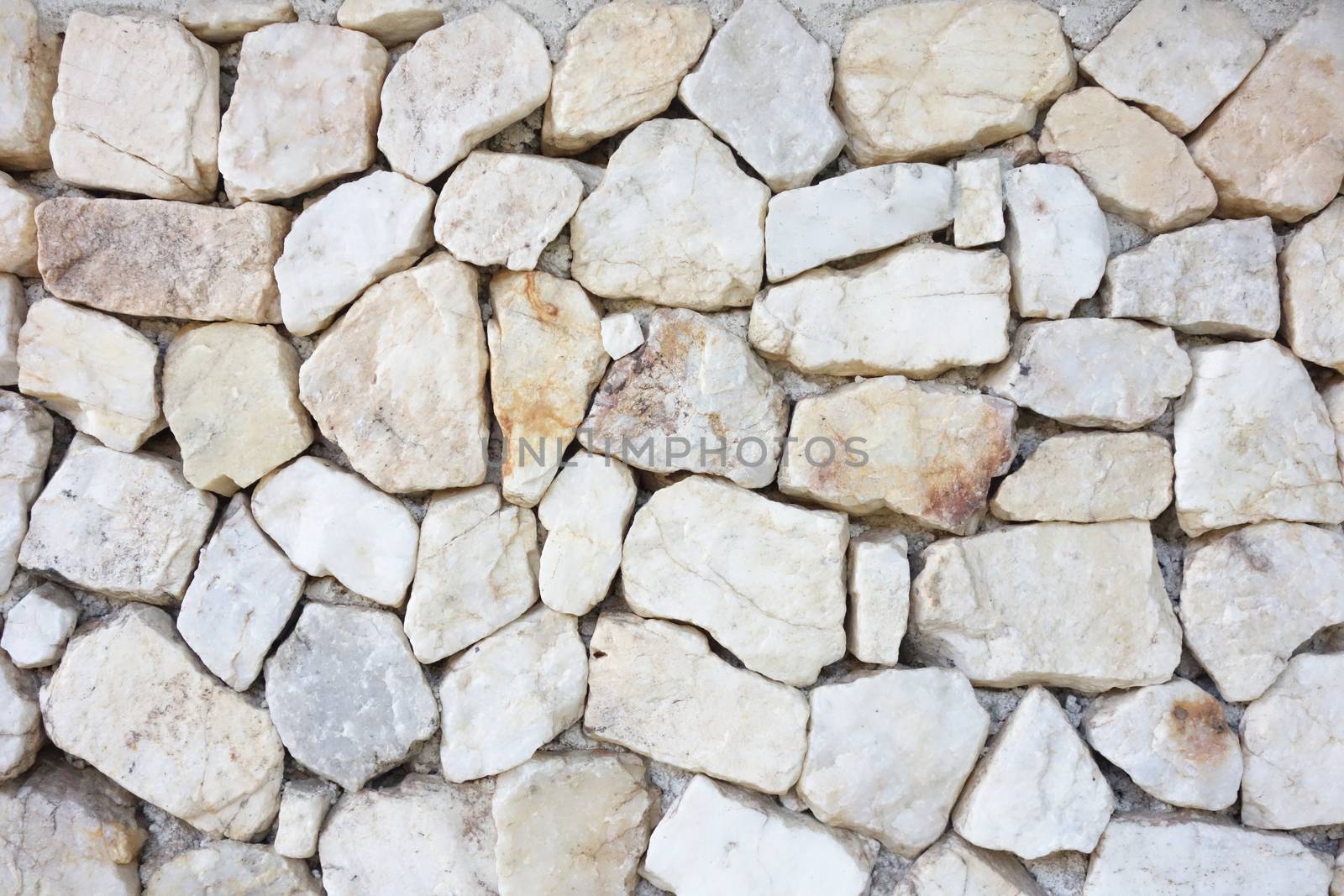 Seamless rock texture background closeup. stone wall.pattern of decorative white slate stone wall surface                               