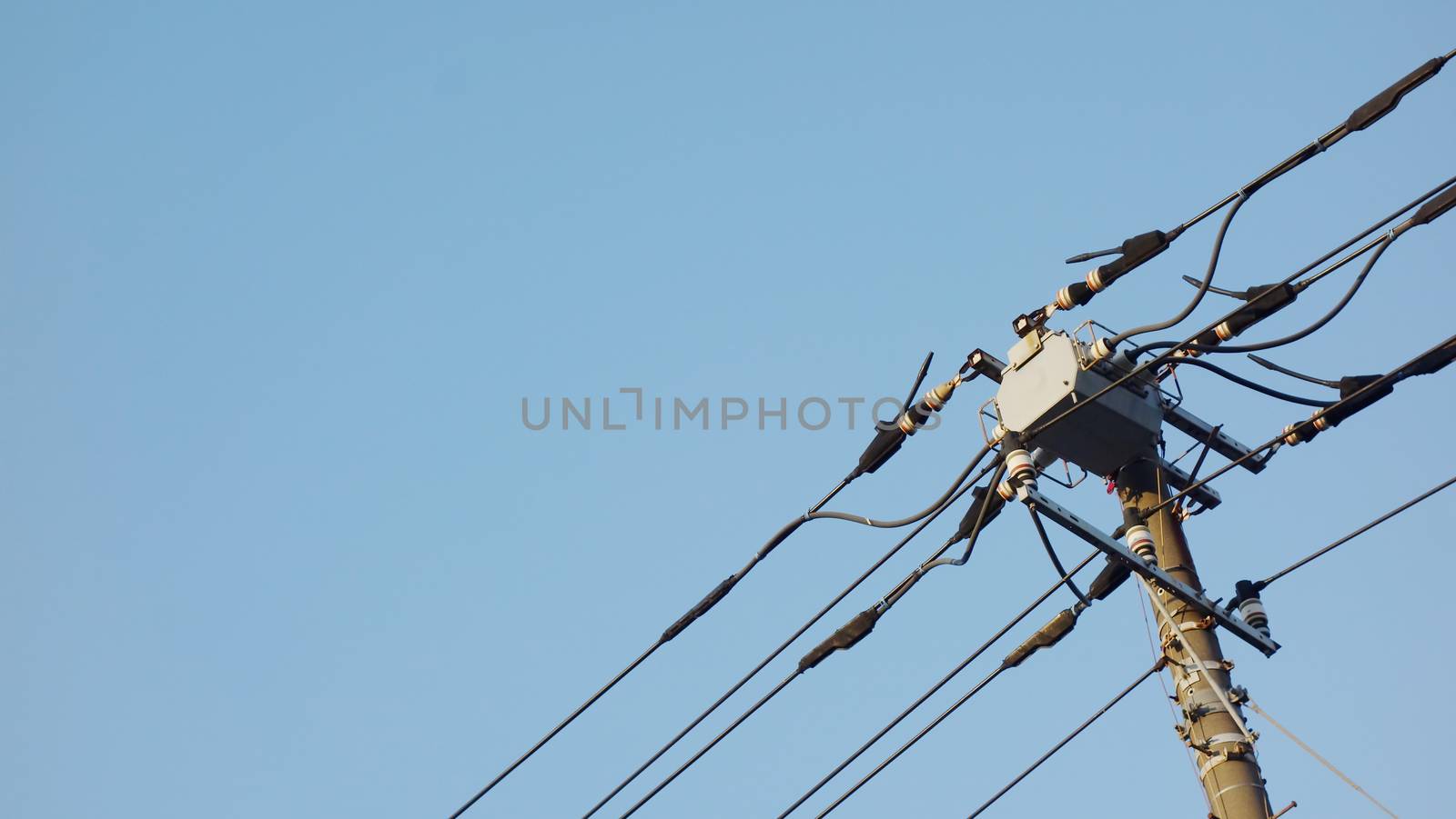 electric pole in Japan with blue sky background. Electricity Power Supply  transfer energy electrical tecnology on cable wire.                                 