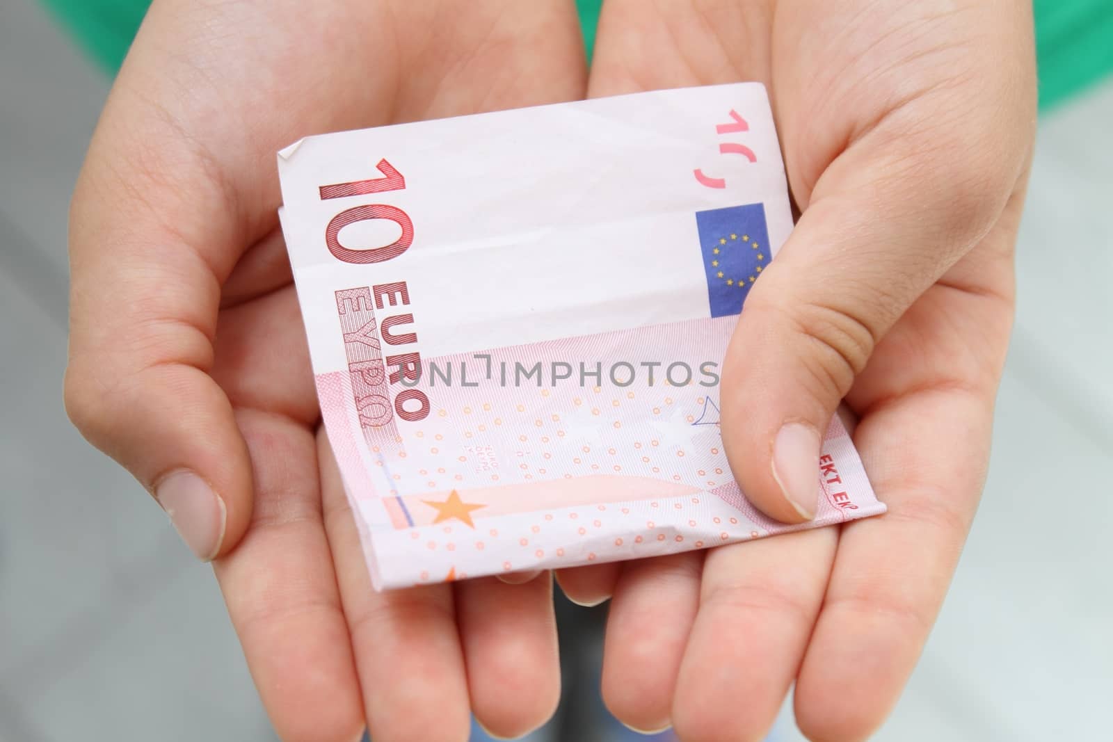 Child's hands  with money