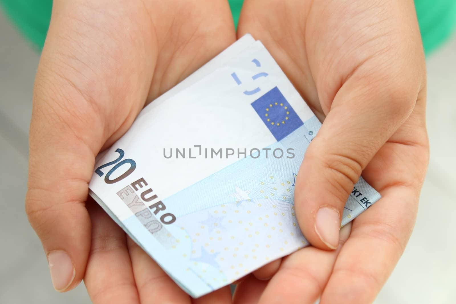 Child's hands  with money