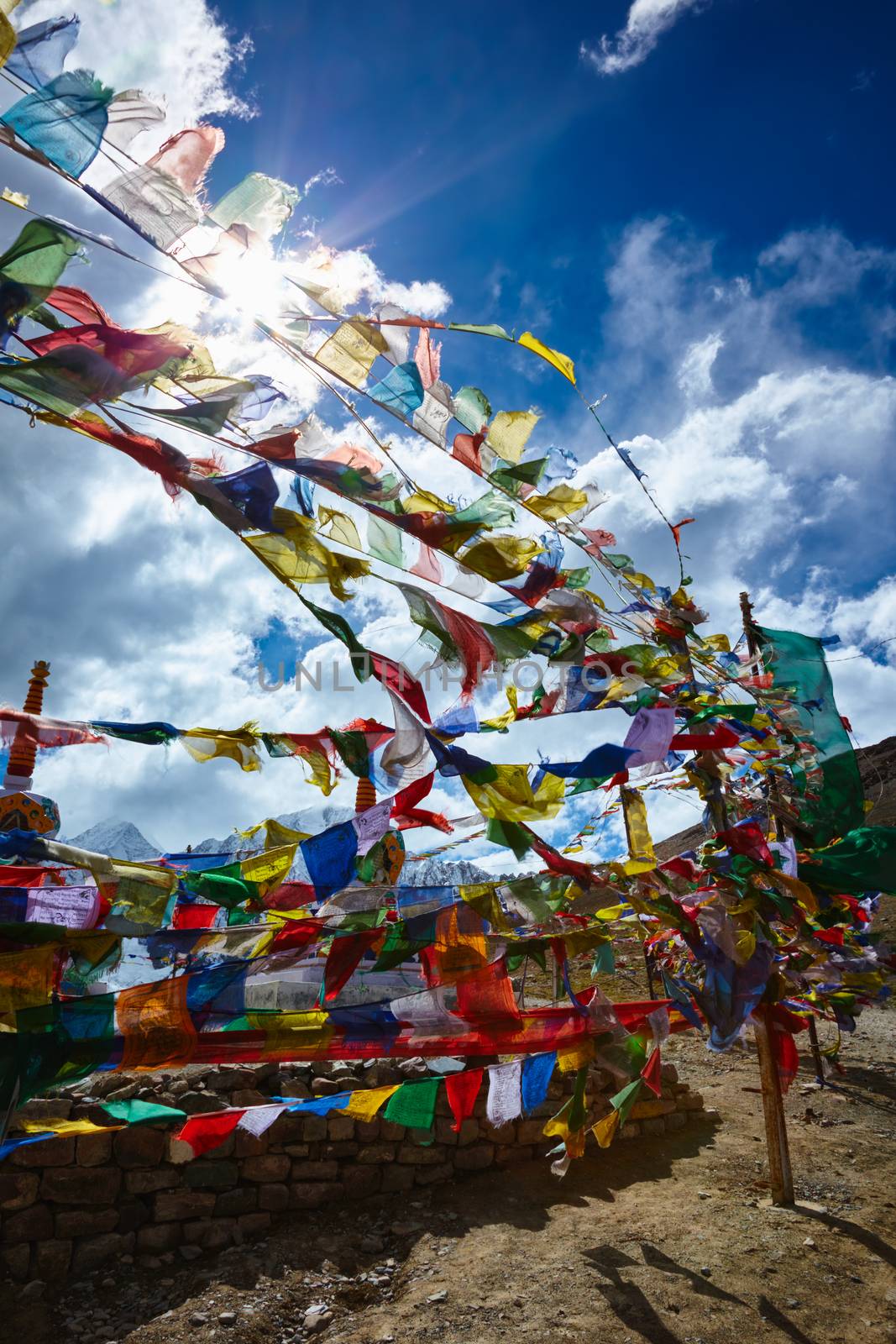 Buddist Prayer flags in Himalayas on top of Kunzum La pass, Himachal Pradesh, India. Elevation 4551 m.