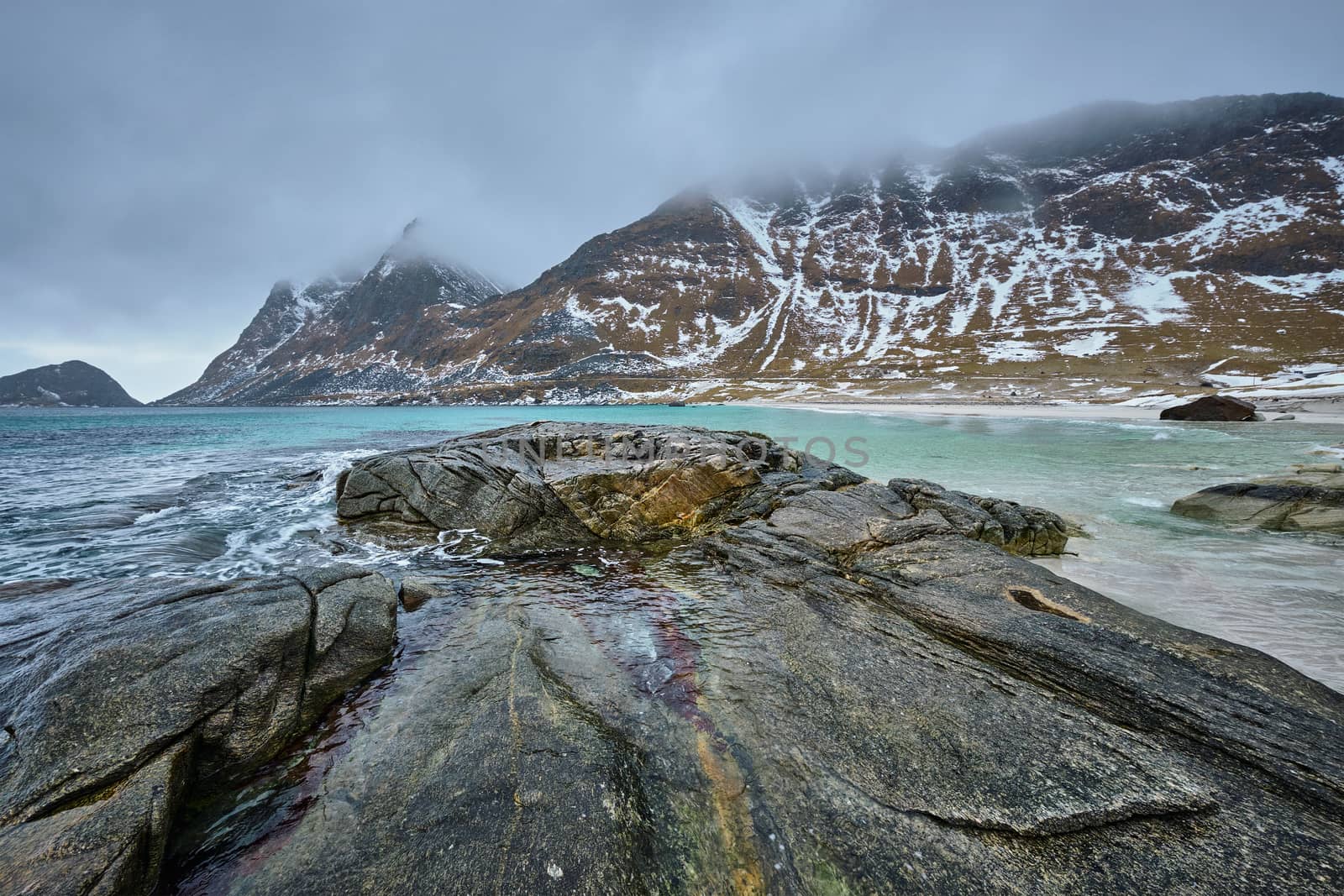 Rocky coast of fjord in Norway by dimol