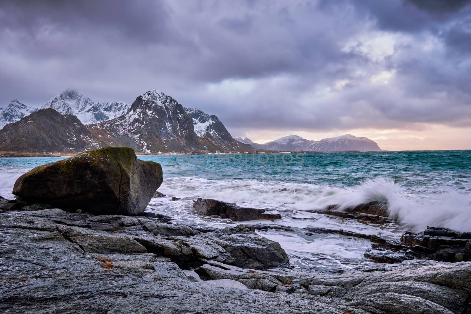 Rocky coast of fjord of Norwegian sea in winter. Vareid, Lofoten islands, Norway