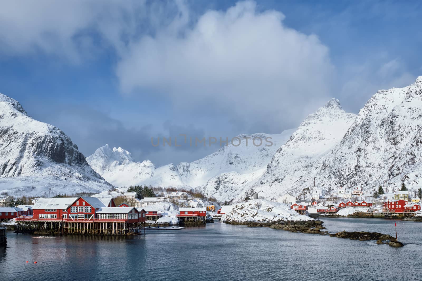 Traditional fishing village A on Lofoten Islands, Norway with red rorbu houses. With snow in winter