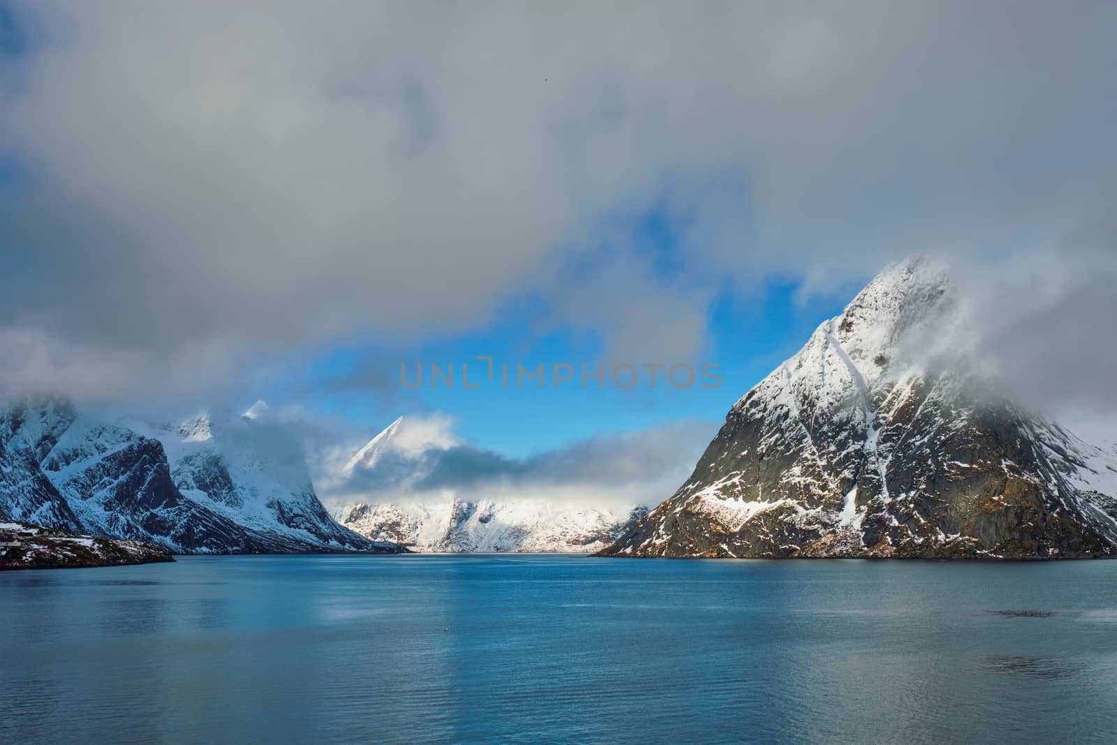 Norwegian fjord and mountains with snow in winter. Lofoten islands, Norway
