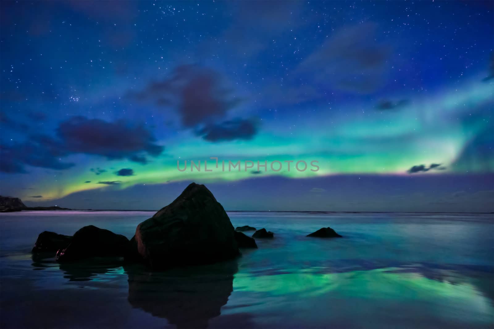 Aurora borealis northern lights on Skagsanden beach. Lofoten Islands, Norway