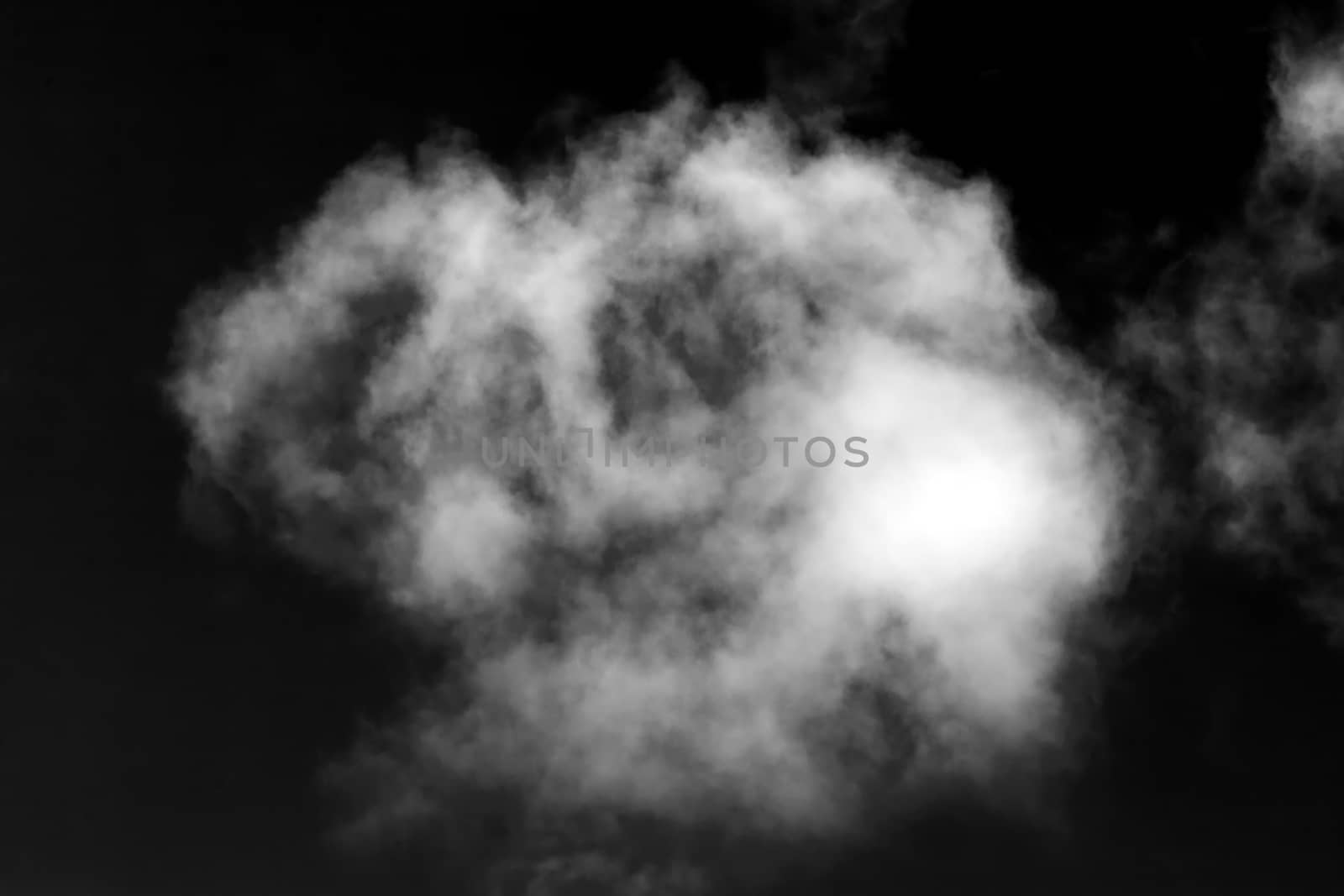 Cloud isolated on a black background for making texture brushes monochrome image