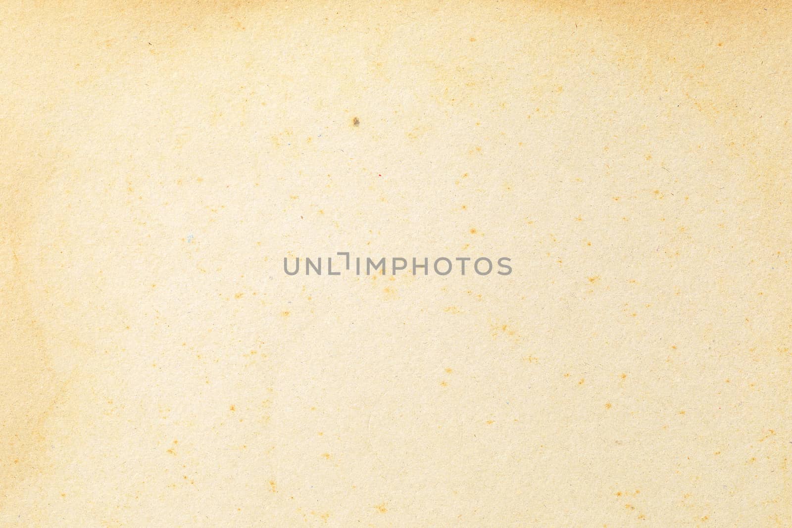 Brown kraft paper background texture with grain and dots