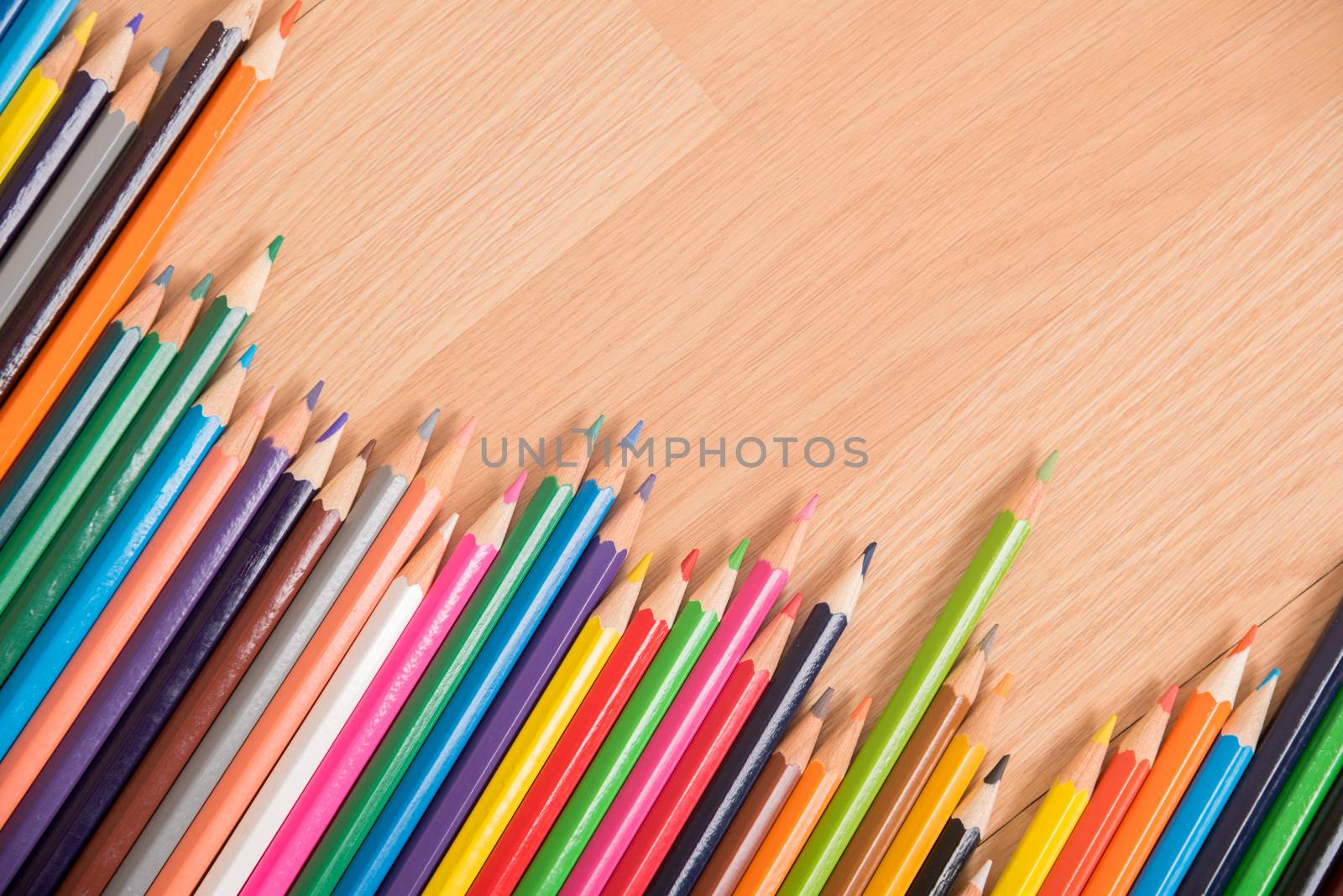 many color pencil on wood background.