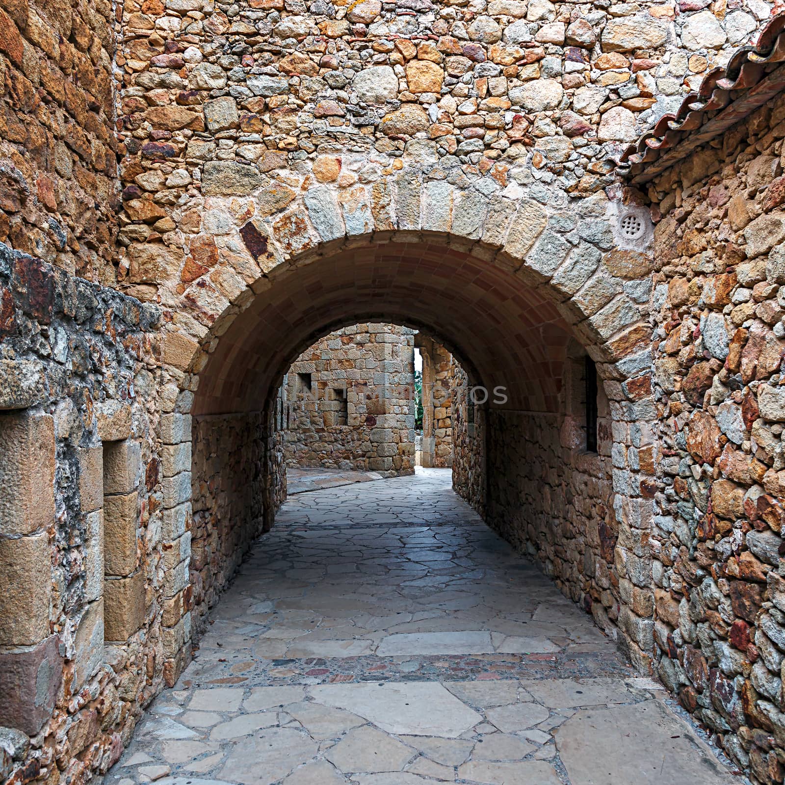 Castle de Pals, historic stone walls and arches, Pals, Spain




