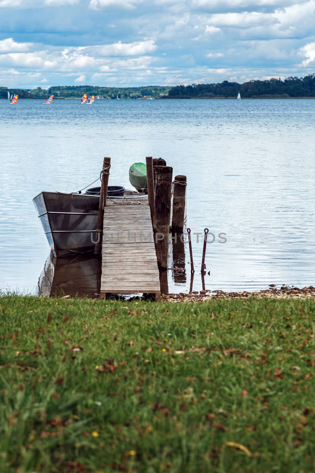 Boat standing on the pier, Lake Chiemsee, Bavaria, Germany by seka33