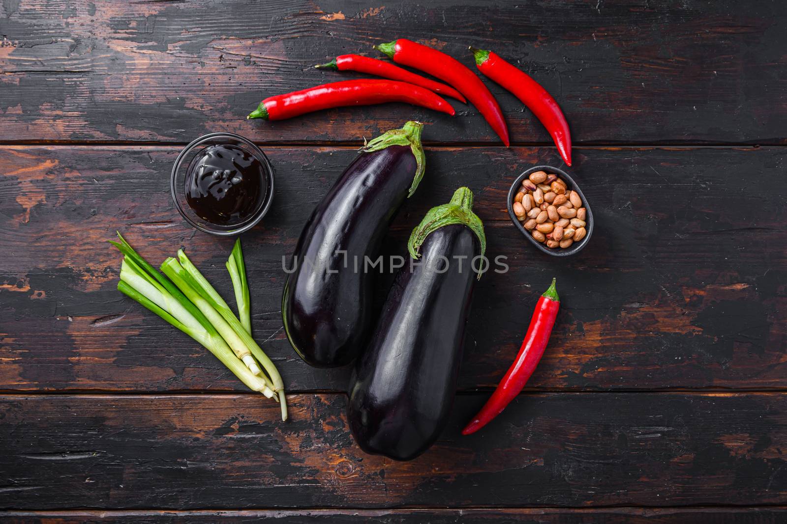 Sticky teriyaki aubergine ingredients, for cooking or grill chili pepper, eggplant, sauce, nuts top view. High quality.