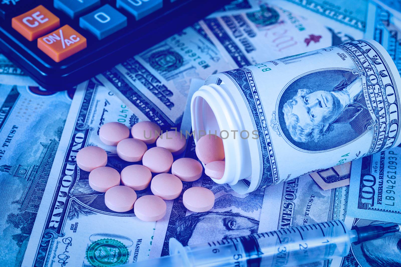 Medicine pills or capsules with dollars concept. by Eugene_Yemelyanov