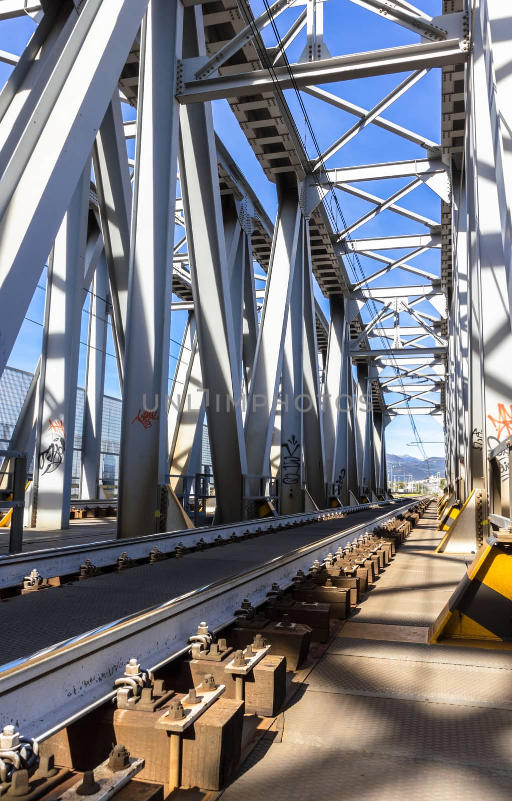Steel bridge railroad. Railway metal bridge perspective view.