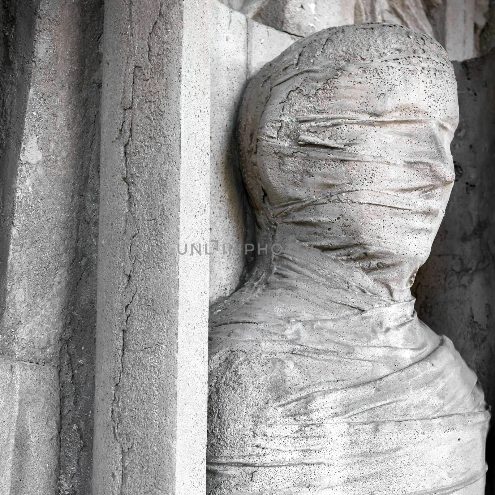 Stone statue of a mummy in a coffin