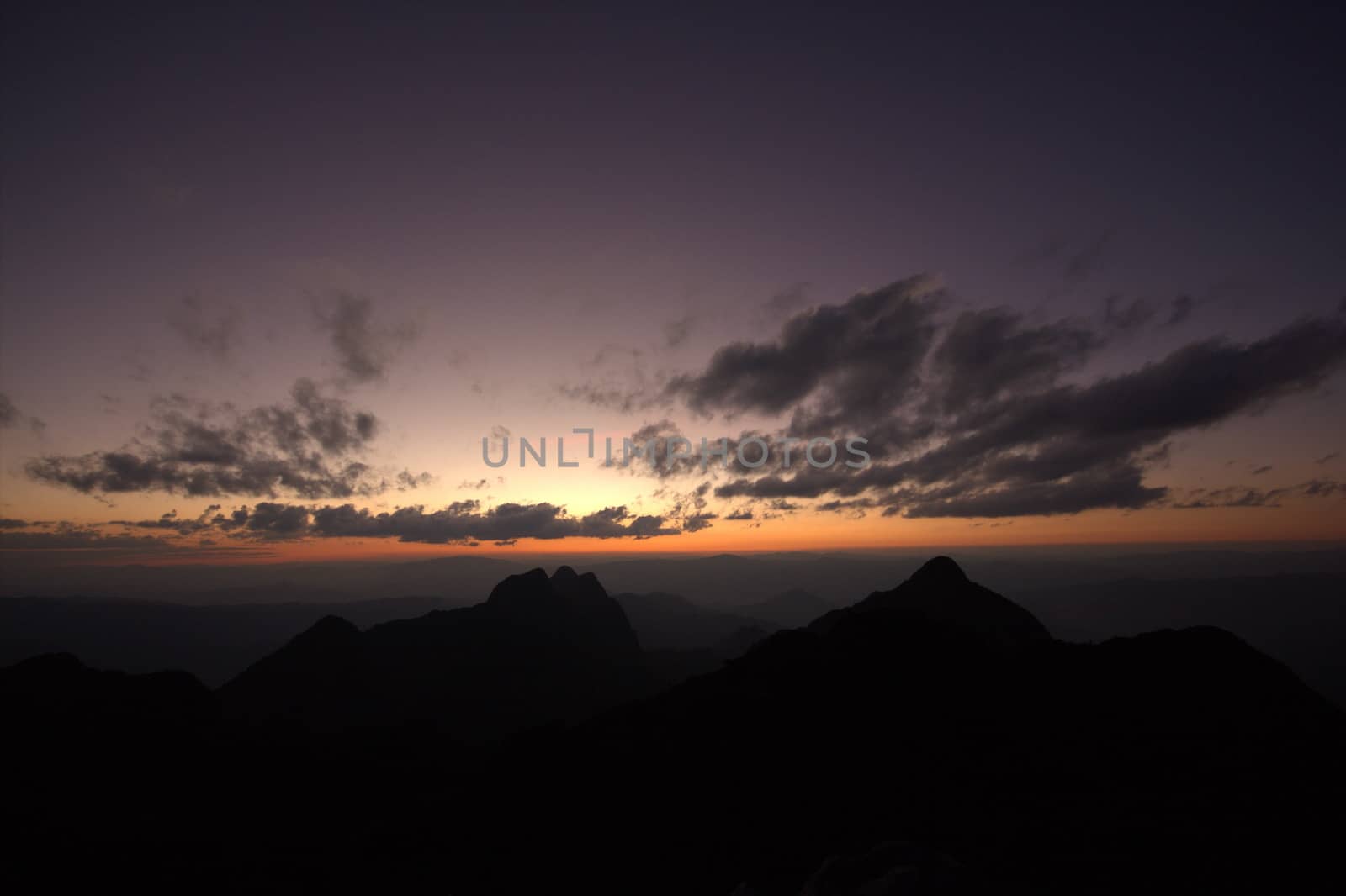 Sunset at the top of the hill at Doi Luang, Chiang Dao, Thailand