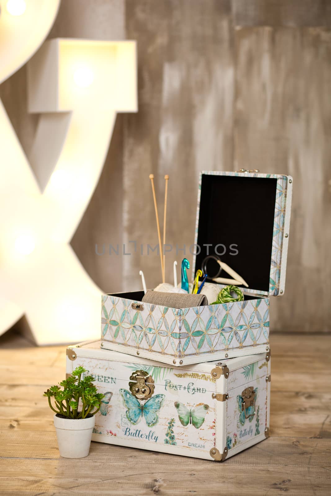 casket for needlework with flower, sewing in style interior