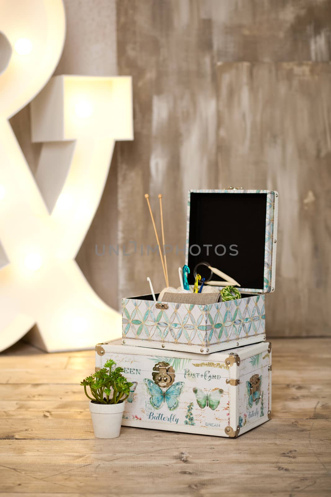 casket for needlework with flower, sewing in style interior