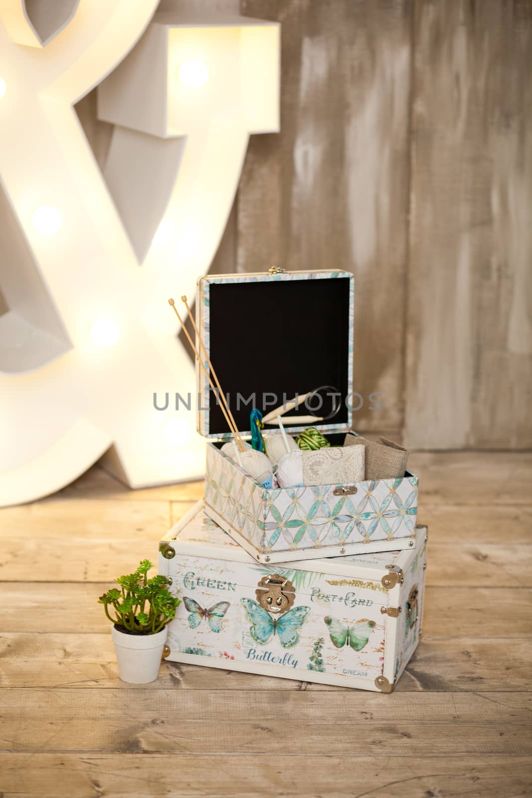 casket for needlework with flower, sewing in style interior