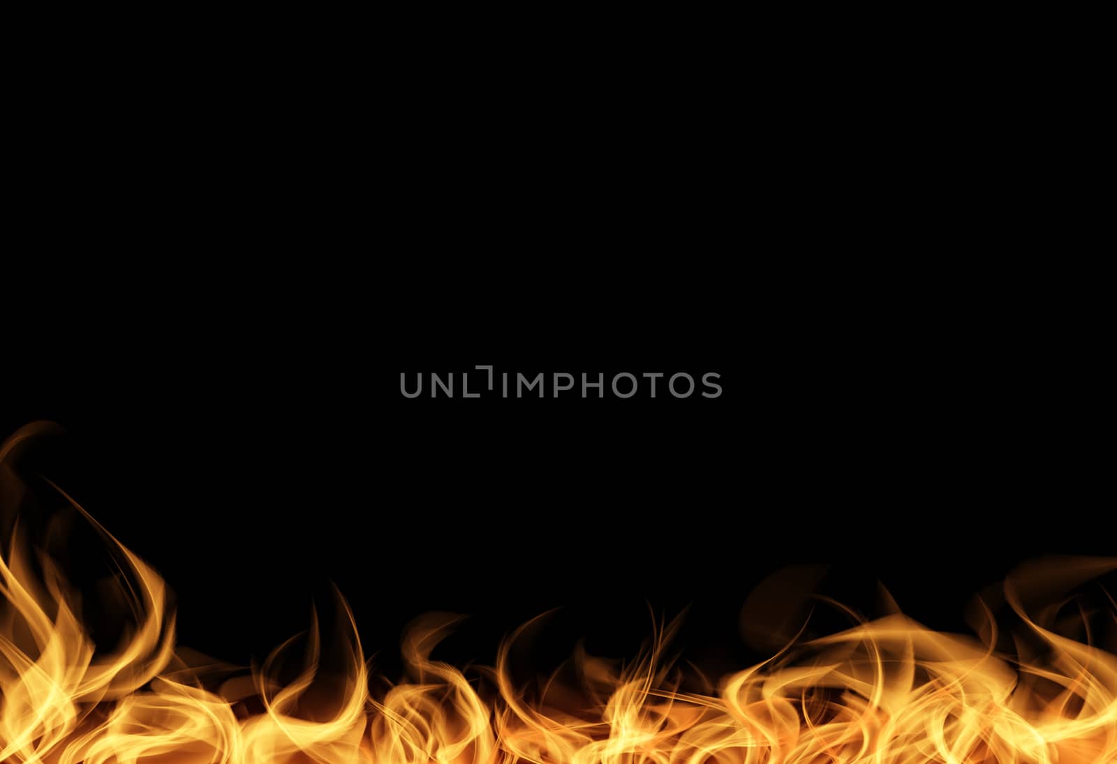 Abstract computer graphic yellow flame on a black background