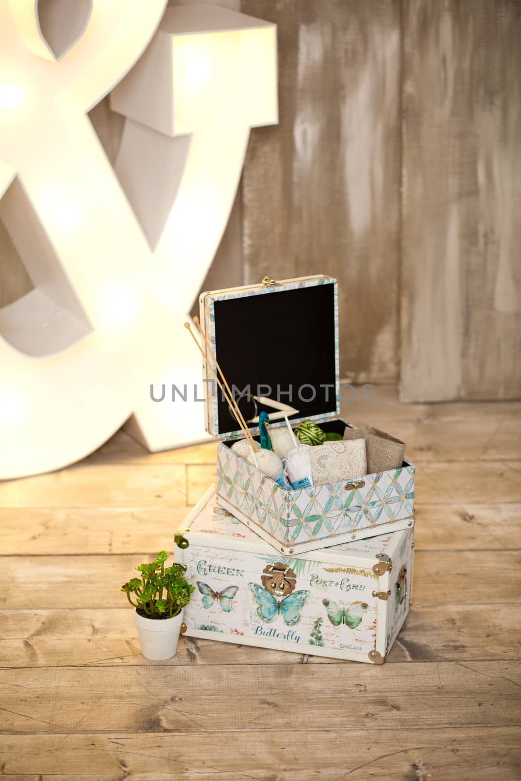 casket for needlework with flower, sewing in style interior