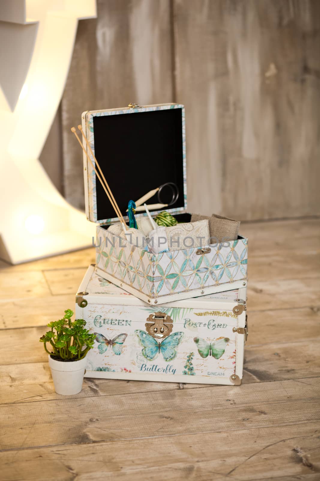 casket for needlework with flower, sewing in style interior