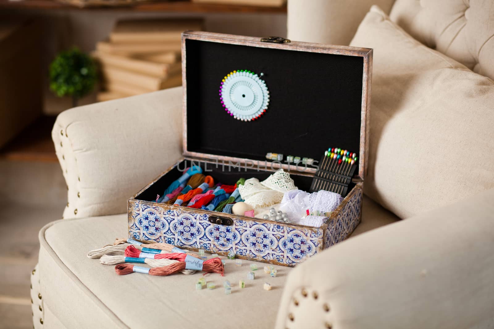 casket for needlework with flower, sewing in style interior
