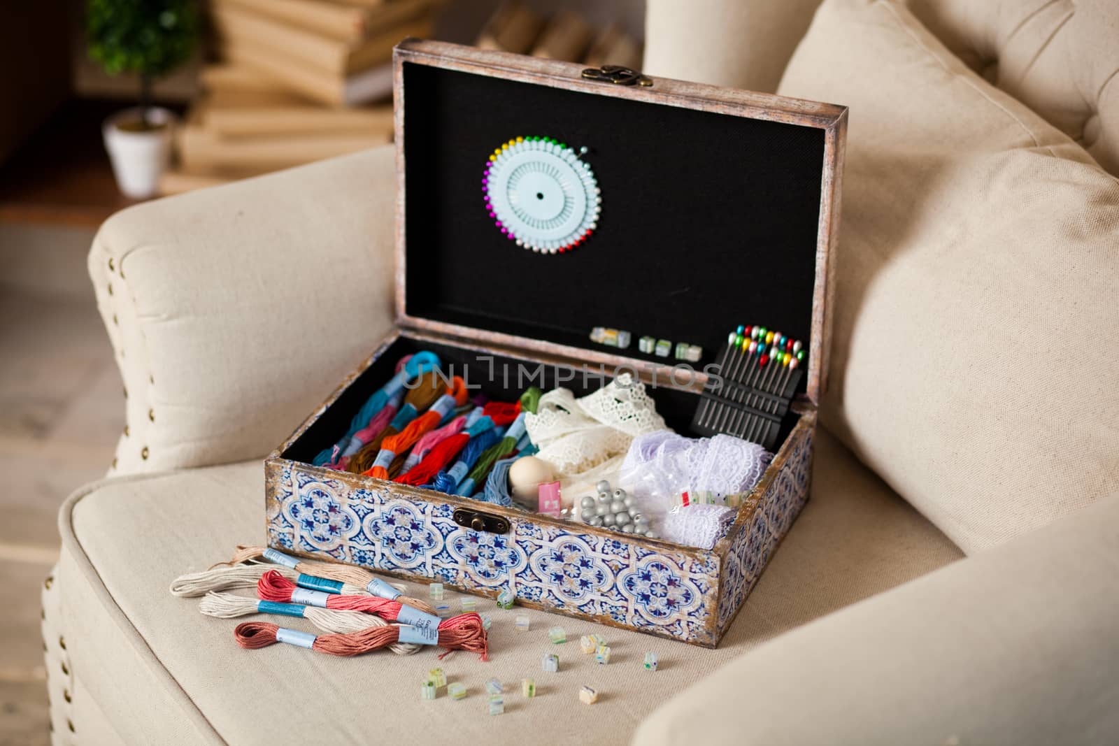 casket for needlework with flower, sewing in style interior