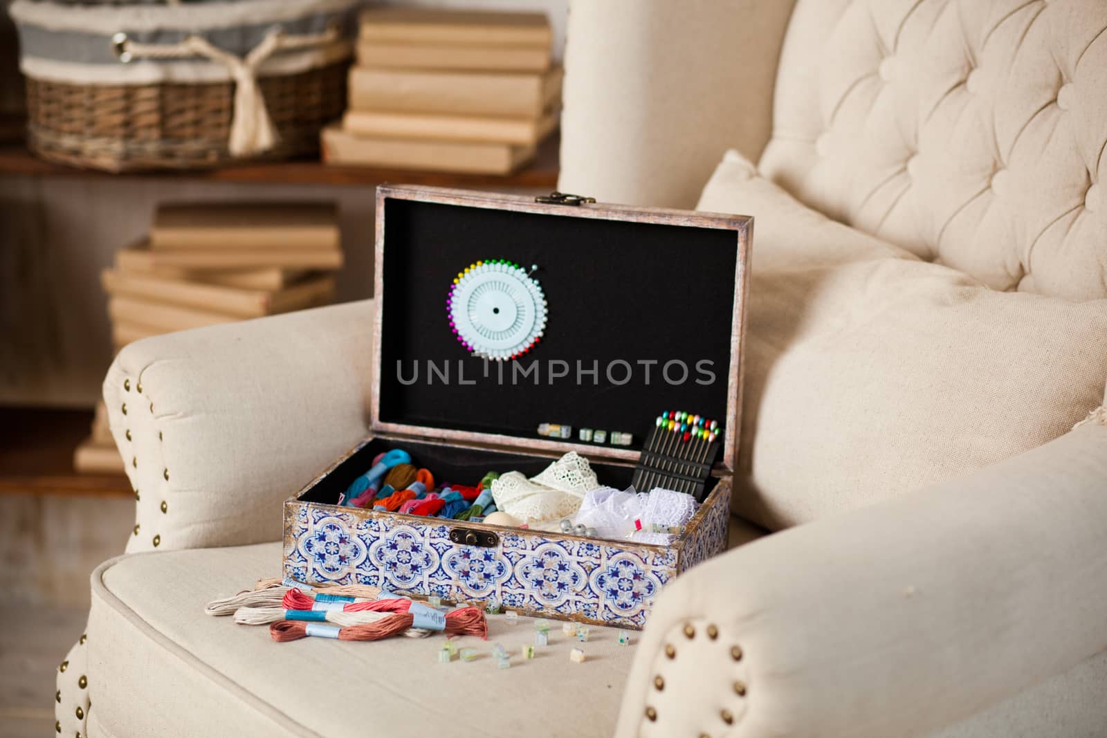 casket for needlework with flower, sewing in style interior