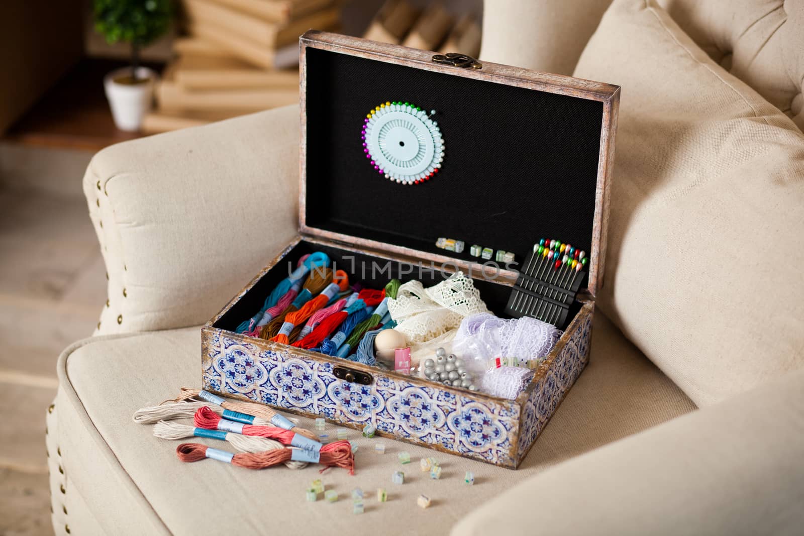 casket for needlework with flower, sewing in style interior