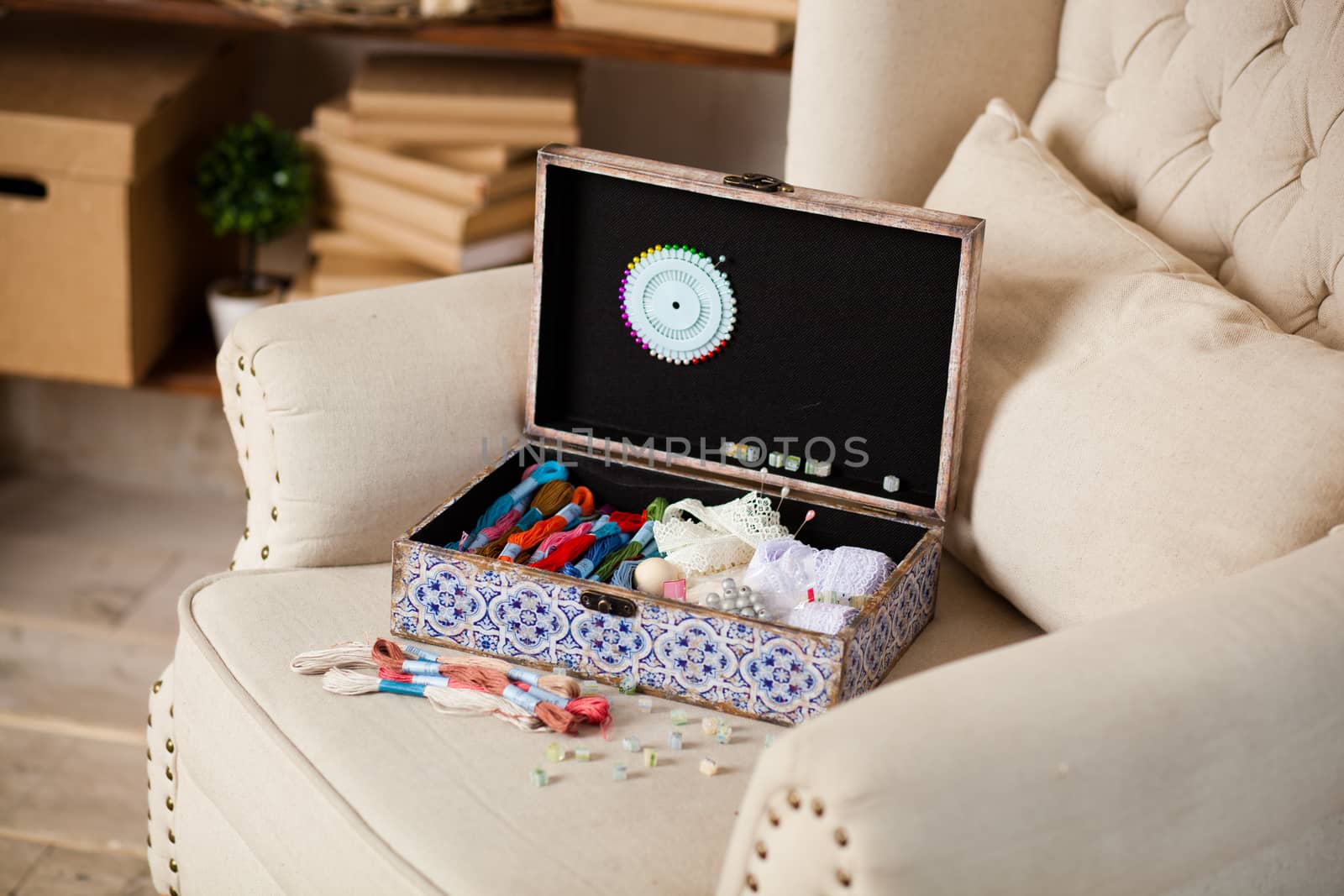 casket for needlework with flower, sewing in style interior