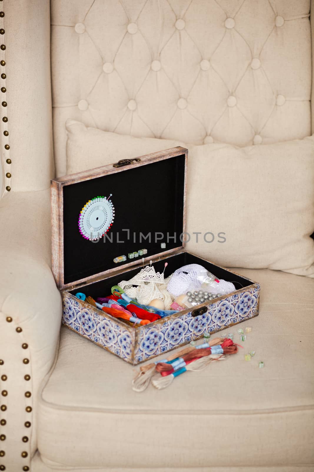 casket for needlework with flower, sewing in style interior