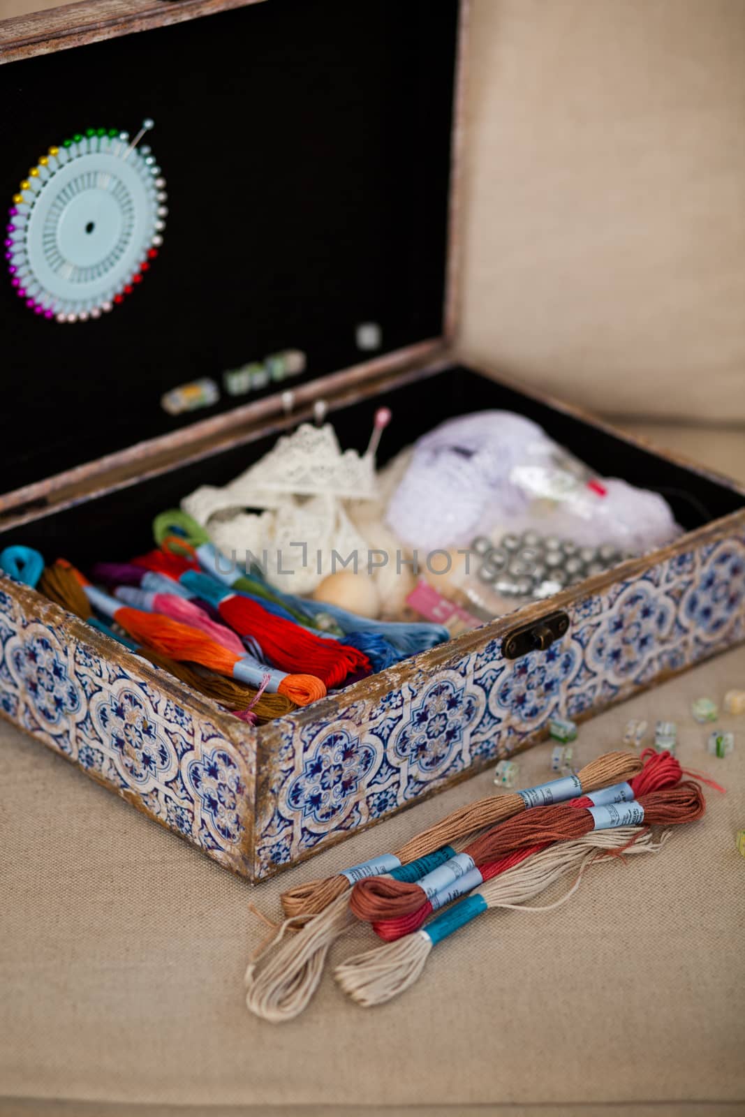 casket for needlework with flower, sewing in style interior