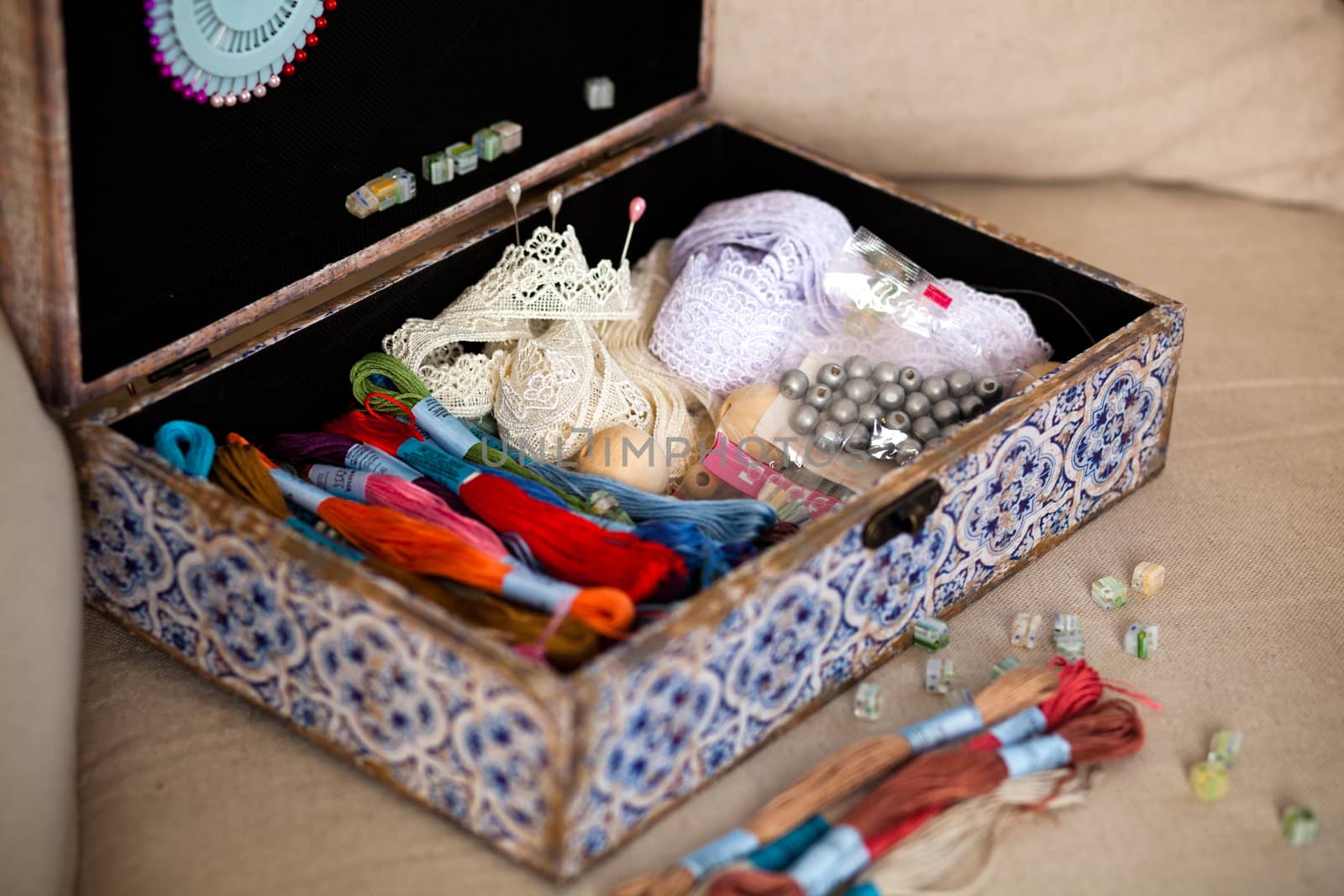 casket for needlework with flower, sewing in style interior