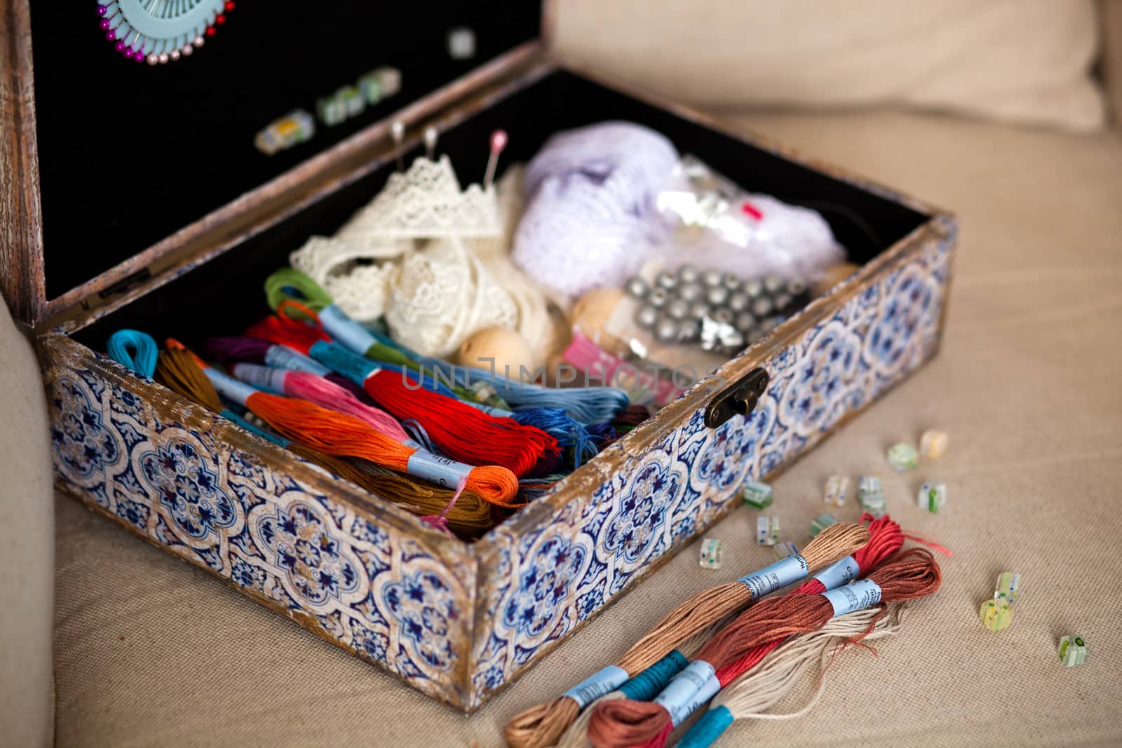 casket for needlework with flower, sewing in style interior