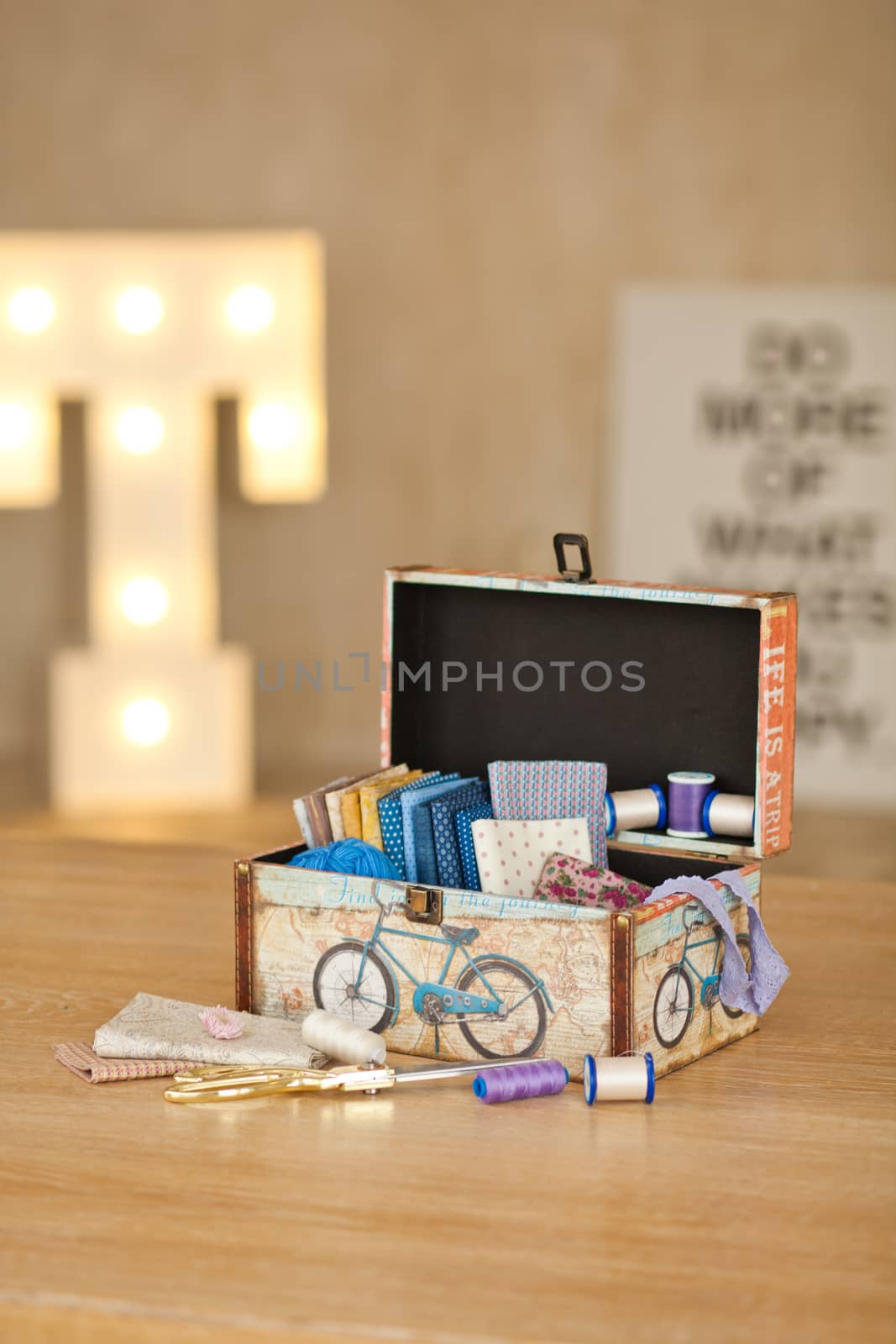 casket for needlework with flower, sewing in style interior